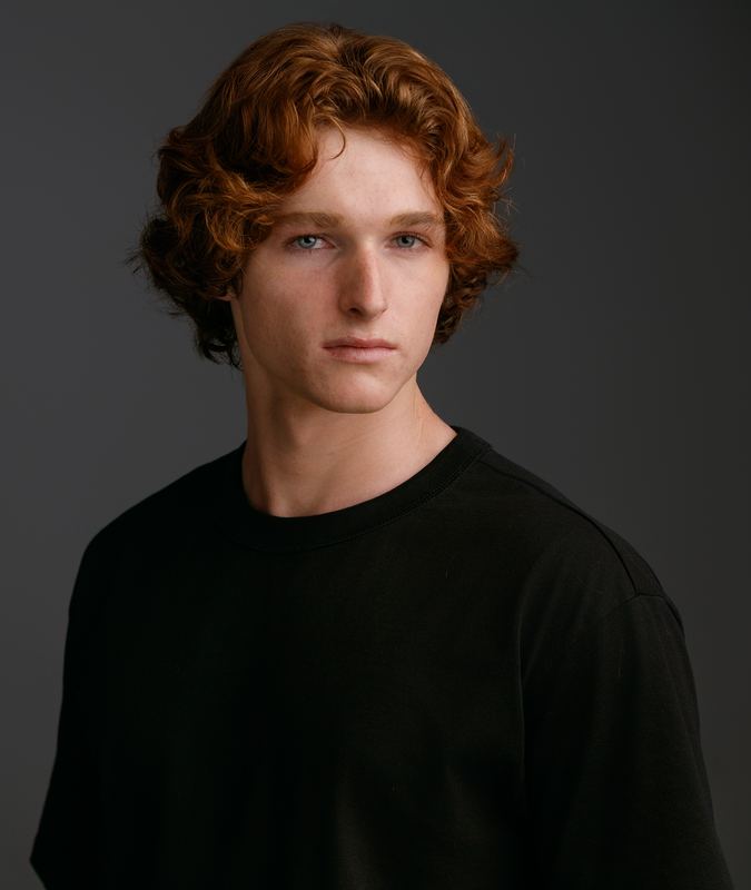 Jake Golden headshot — warm smile